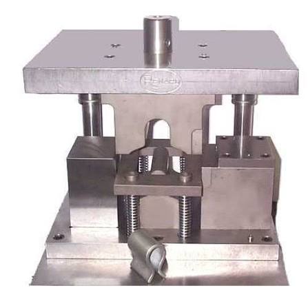 Precision press tool die set with finished metal component